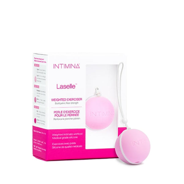 A pink box labeled “Intimina Laselle Kegel Exercisers” contains a pink, spherical pelvic floor exerciser with a white cord, designed to help strengthen pelvic muscles, shown next to its packaging.