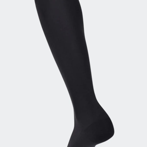 Black knee high compression stockings for improved blood circulation and reduced leg fatigue, ideal for use during pregnancy and post partum, for athletes, travelers, and individuals with varicose veins.