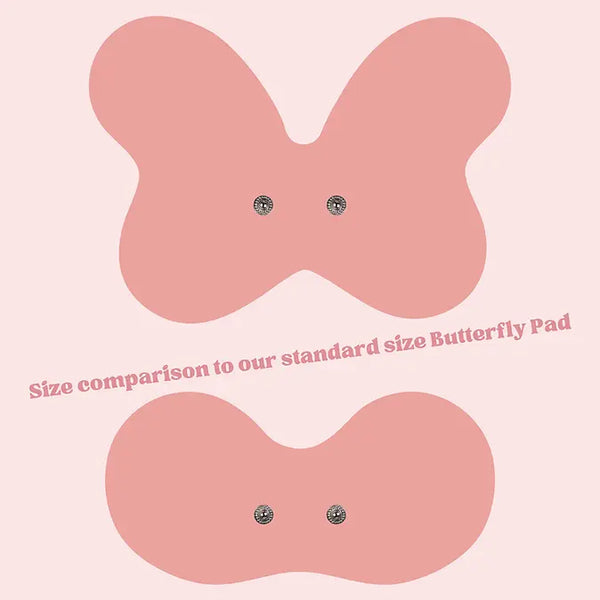 Replacement pad range for the Tap 2.0 wearable device – four pad shapes in blush pink and midnight black, including XL Butterfly Back, Butterfly, Electrode, and Discreet