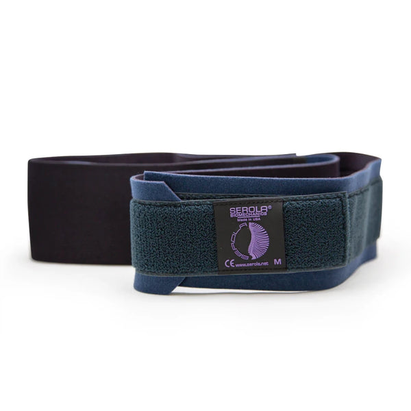 Image of the Serola Sacroiliac Belt, predominantly black with a blue lining and featuring a purple label at the front. The label showcases the Serola brand logo, name, and additional product details. This belt is engineered to support the sacroiliac joint in the lower back, delivering effective lower back pain relief and addressing pelvic instability.