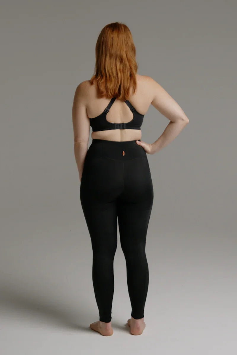 Back view of black SRC Restore full-length compression leggings