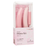 The CalExotics Inspire Vibrating Dilator Kit 3-Piece Set includes three pink silicone dilators and a vibrating device for gentle pelvic floor therapy. The box features product info and a breast cancer awareness ribbon.