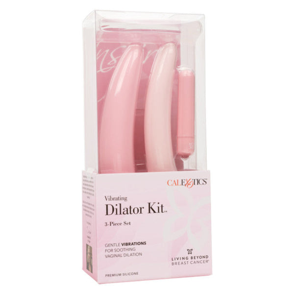 The CalExotics Inspire Vibrating Dilator Kit 3-Piece Set includes three pink silicone dilators and a vibrating device for gentle pelvic floor therapy. The box features product info and a breast cancer awareness ribbon.