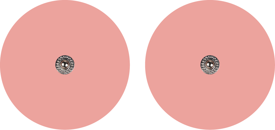 Two blush pink circular electrode replacement pads for the Tap 2.0 – designed to pair with the Tap 2.0 electrode cord for spot placement