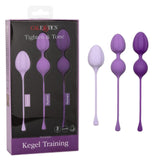 CalExotics offers a 3-piece Kegel Weights set made from body-safe silicone, showcasing multiple shades of purple. Each weight features a smooth, spherical design with a retrieval cord, ideal for strengthening and toning pelvic floor muscles.