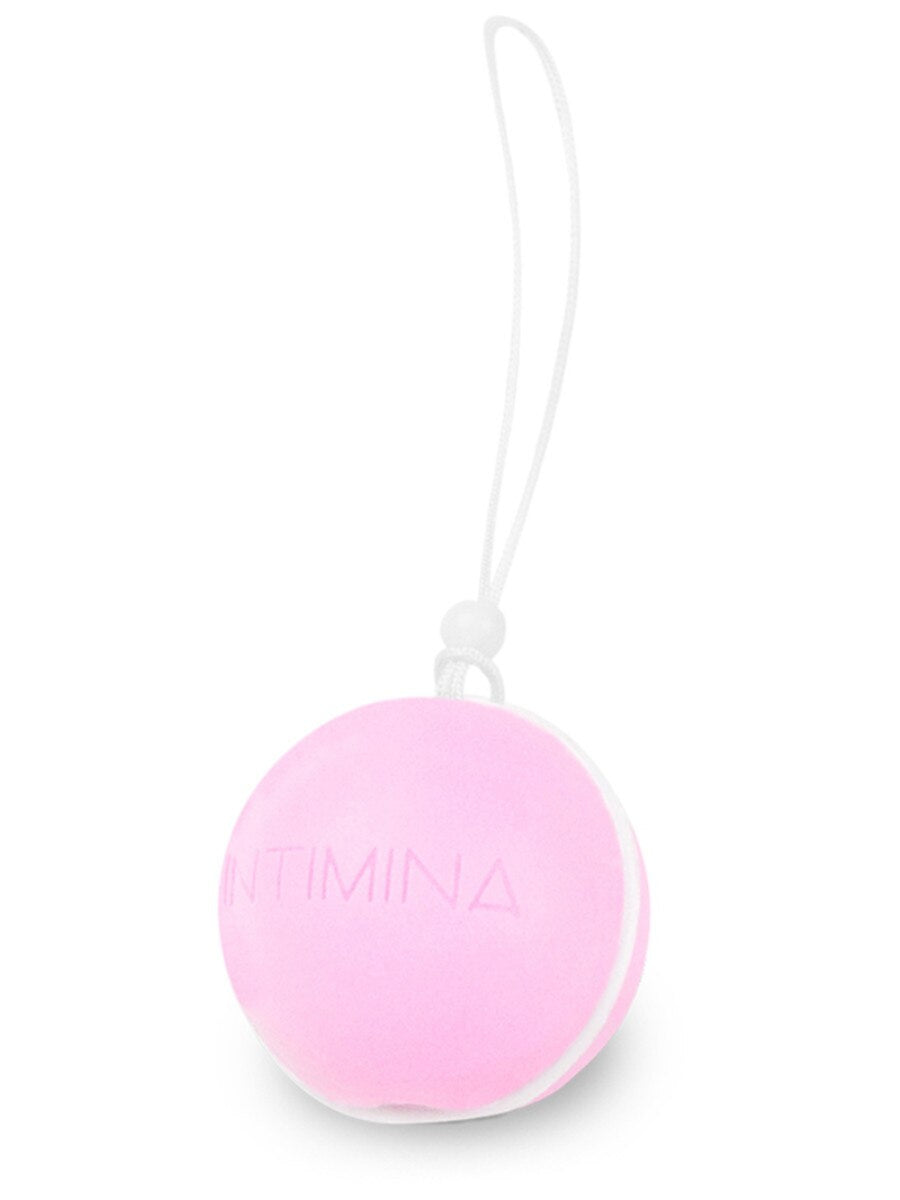 The Intimina Laselle Kegel Exercisers are small, round, pink silicone balls with "INTIMINA" embossed and a white string loop—an ideal minimalistic choice for strengthening pelvic floor muscles.