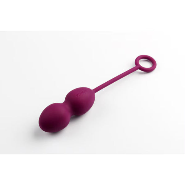 The Intimina Laselle Kegel Exercisers, featuring two connected purple silicone spheres and a looped handle, are designed to strengthen pelvic floor muscles and shown on a white background.