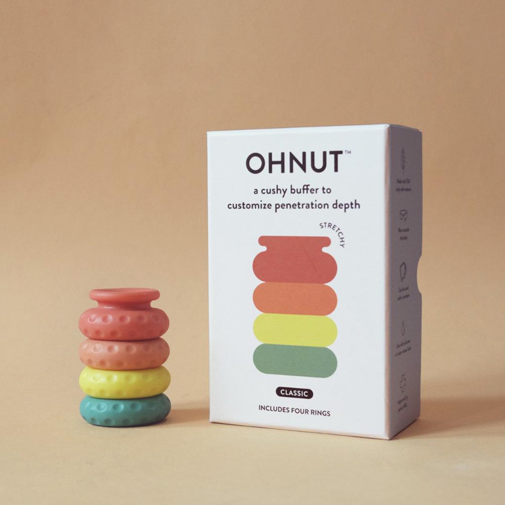 The full Ohnut depth-limiting rings 4-ring set displayed with its product packaging — soft polymer buffer rings stocked in Australia for comfortable depth control during sex. The Pelvic People brand, available at Blossom Pelvic Health.