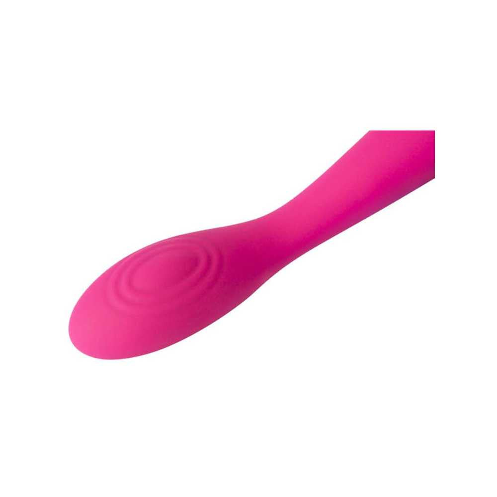 Close-up of the Svakom Iris Slim Semi-Flexible G-Spot Vibrator, a pink silicone toy with a curved, oval-shaped tip featuring circular patterns. The smooth, flexible design may help relieve pelvic pain. White background.