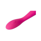 Close-up of the Svakom Iris Slim Semi-Flexible G-Spot Vibrator, a pink silicone toy with a curved, oval-shaped tip featuring circular patterns. The smooth, flexible design may help relieve pelvic pain. White background.