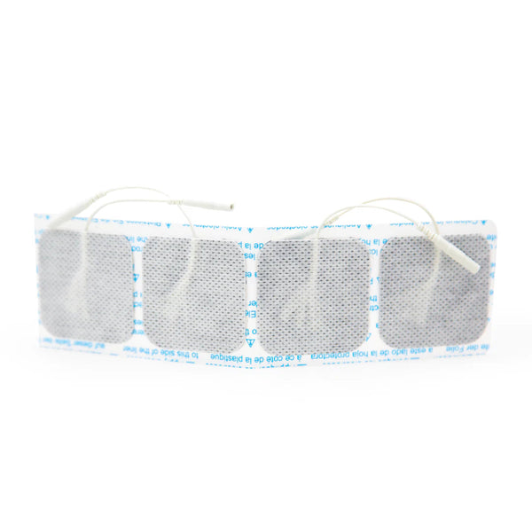 A row of four square AllCare Electrodes with wires, featuring a mesh-like texture, partially wrapped in white and blue backing for secure therapy sessions.