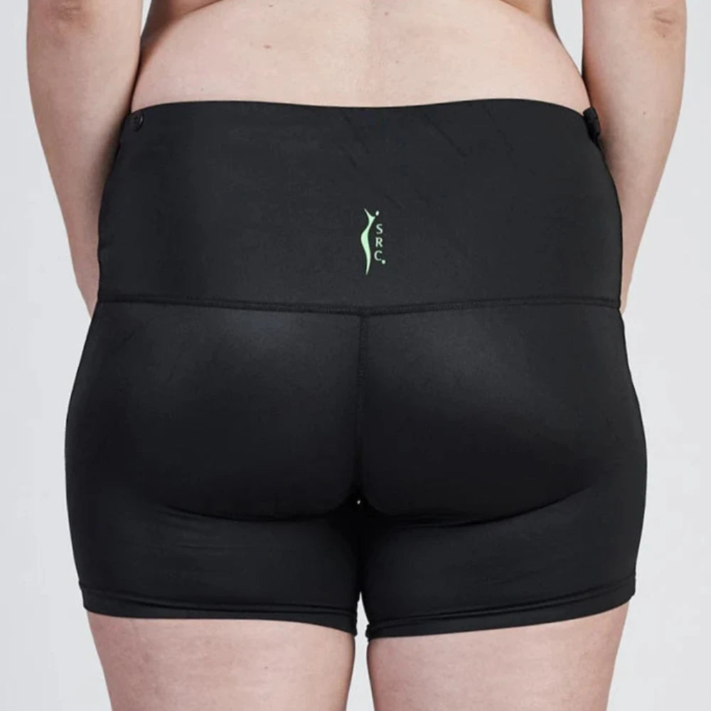A person wearing a black SRC Maternity Shorts Mini from SRC Health and a matching black sports bra, with a small green logo on the back. The image is taken from behind, showcasing the back of the athletic wear designed for excellent support and comfort.