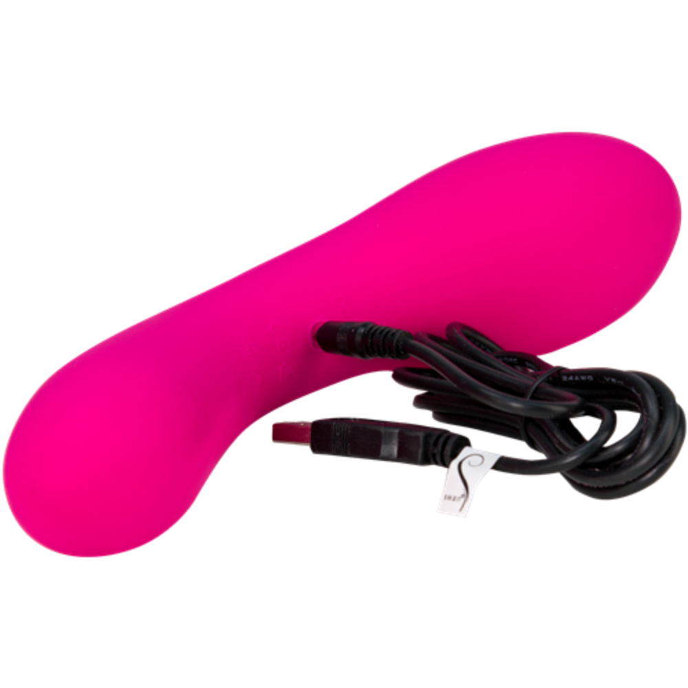 Introducing The Swan Wand by Swan: a vibrant pink, curved personal massager specifically designed for G-spot stimulation with a smooth surface. This phthalate-free vibrator includes a sleek black USB charging cable adorned with an elegant white tag, all set against a pristine white background.