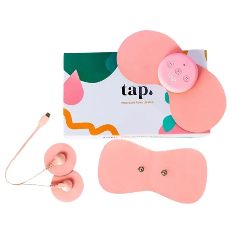 TAP Wearable TENS device in blush pink with silicone cover, shown on white background