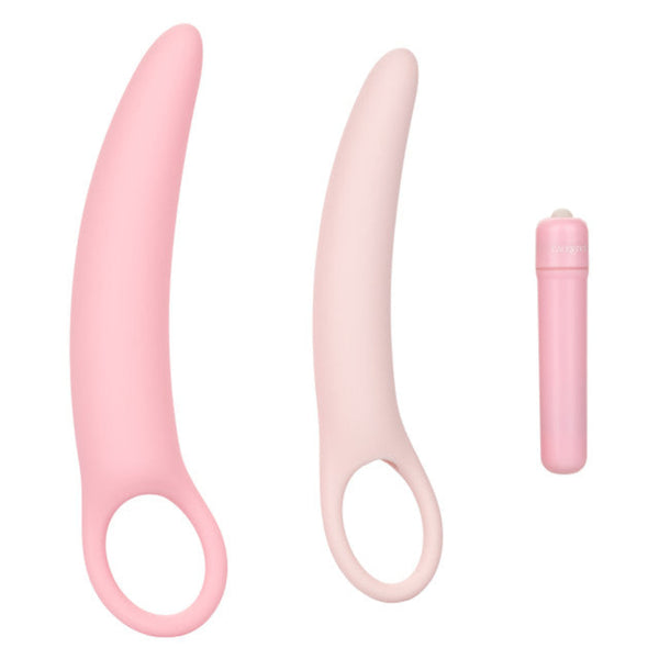 The Calexotics Inspire Vibrating Vaginal Dilator Kit 3-Piece Set features two pink silicone dilators with ring-shaped handles and a matching bullet vibrator, perfect for pelvic floor therapy and comfort.