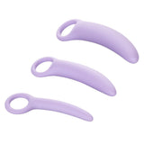 The Dr. Laura Berman® Alena™ Set of 3 Silicone Vaginal Dilators by Calexotics features lavender, smooth, curved dilators with circular handles, arranged diagonally on a white background—ideal for pelvic floor rehabilitation.