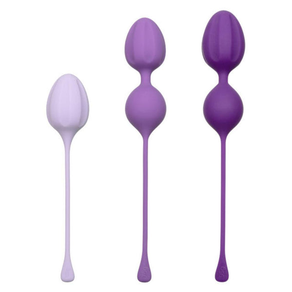 A set of Calexotics Kegel Weights, consisting of three purple-toned exercise balls crafted from body-safe silicone, is displayed. Each ball showcases a round and smooth design with a long, flexible tail for easy handling, making it ideal for effectively enhancing pelvic floor muscles.